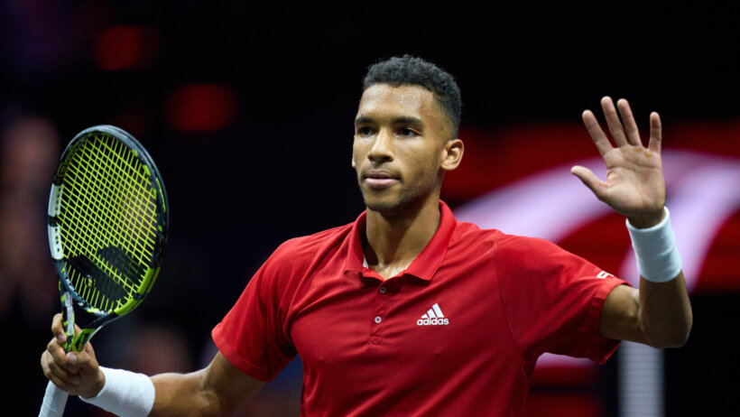 Felix Auger-Aliassime waving to the crowd after a Laver Cup match