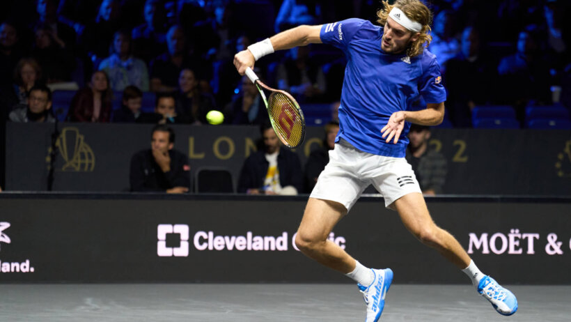stefans Tsitsipas stabs at a volley