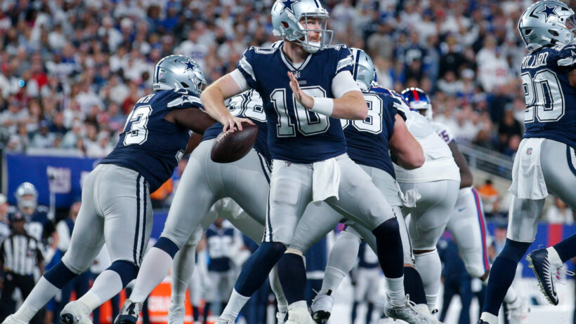 Cooper Rush throwing pass