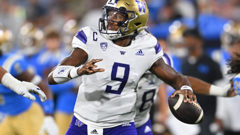 Washington Huskies quarterback Michael Penix Jr. sets to pass