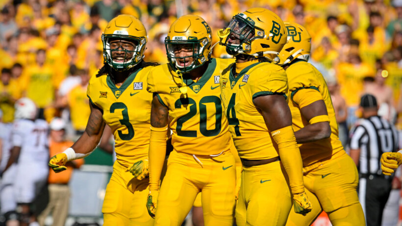 Baylor Bears cornerback Mark Milton (3) and safety Devin Lemear and safety Christian Morgan celebrates making an interception