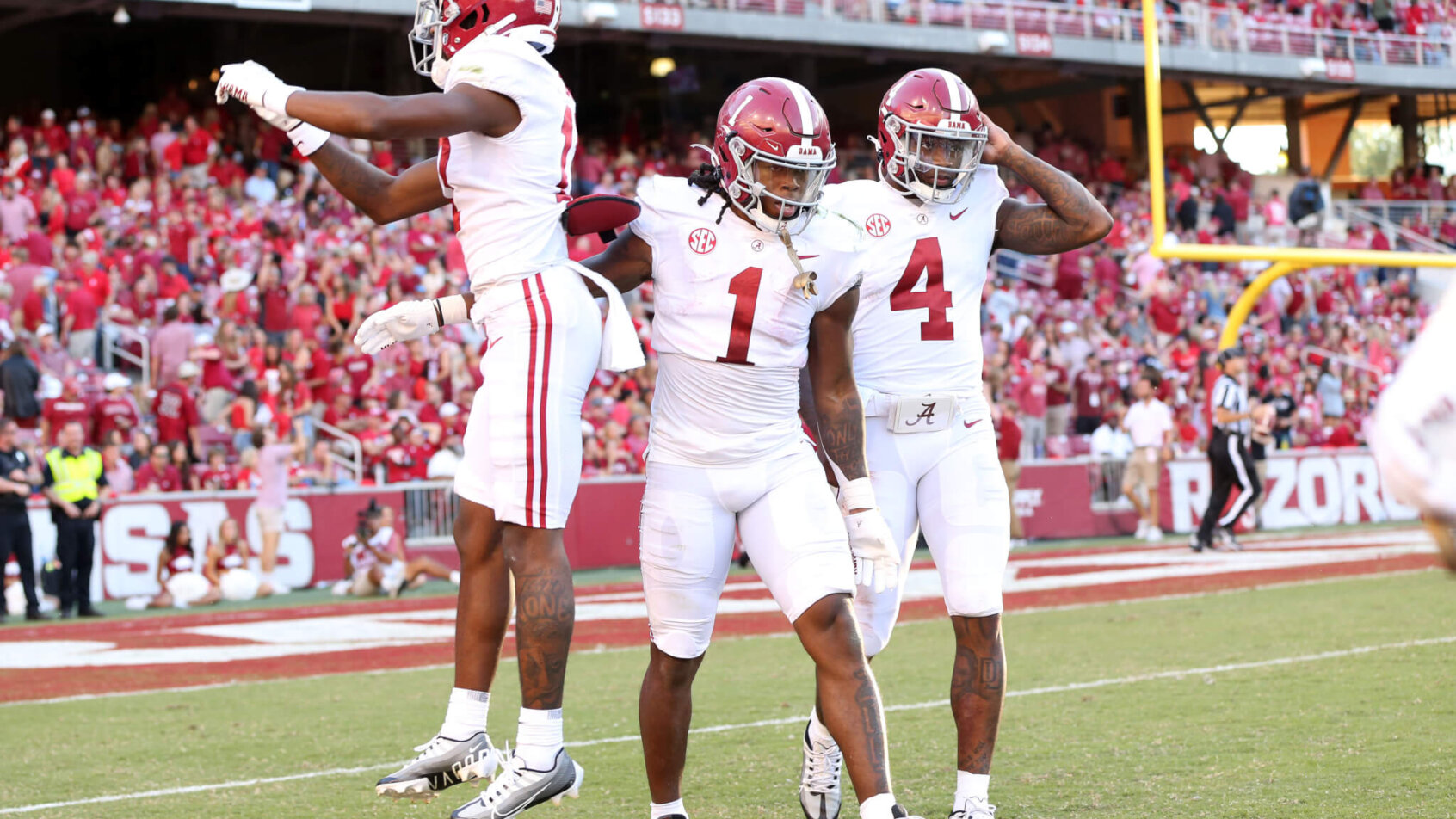 Alabama Crimson Tide players celebrating a TD