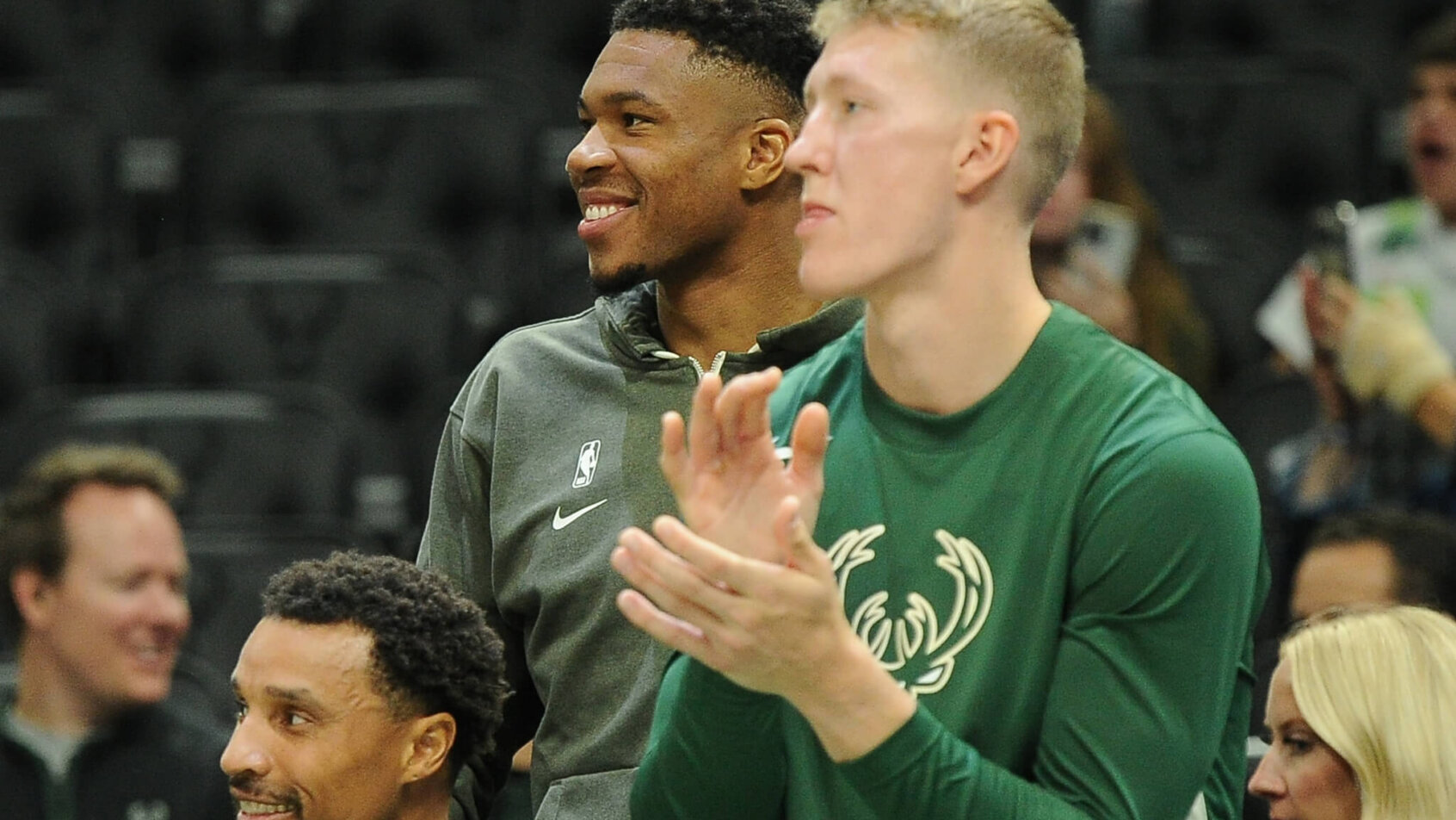 Milwaukee Bucks forward Giannis Antetokounmpo watches his team in street clothes against the Memphis Grizzlies