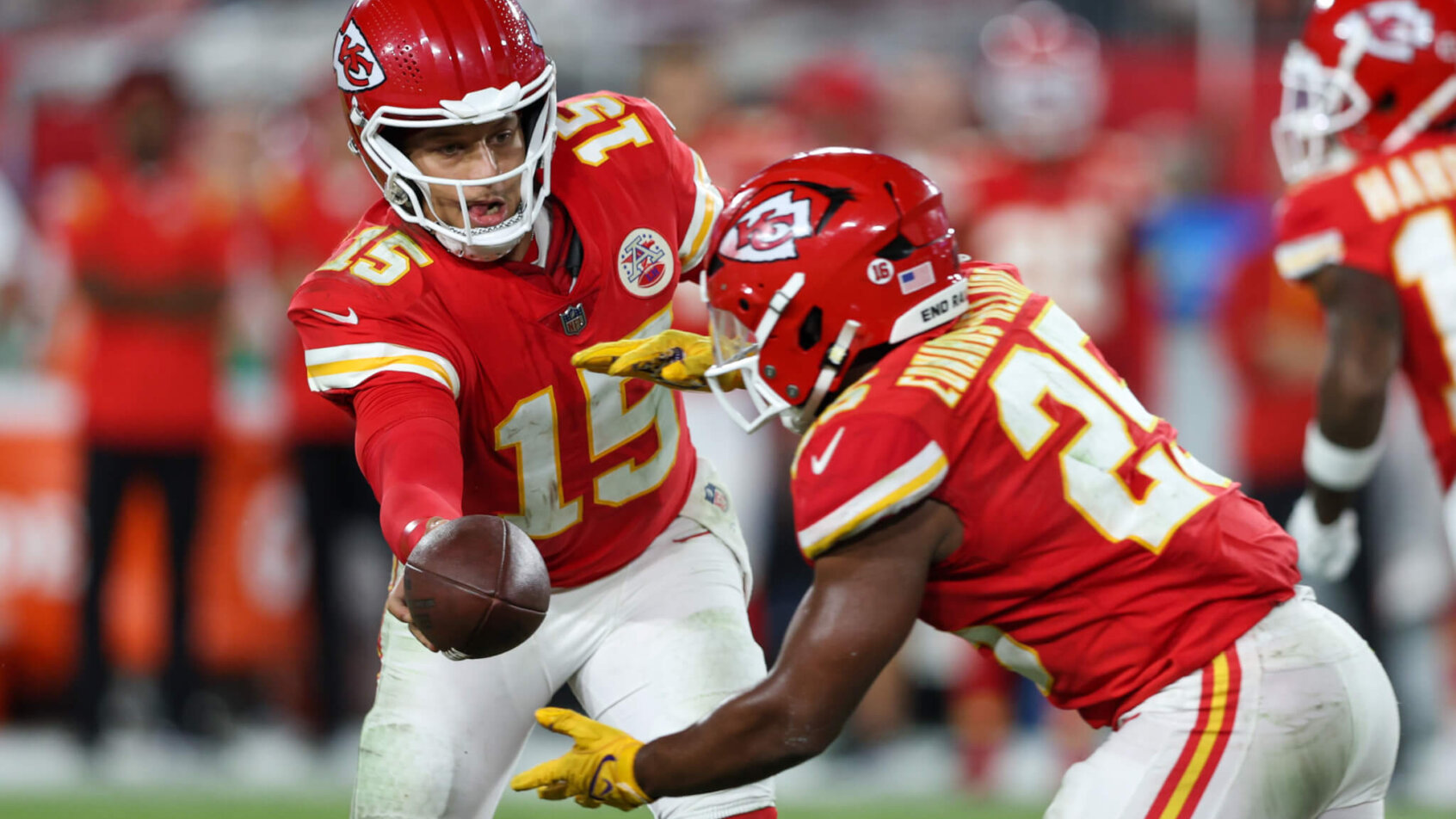 Patrick Mahomes hands off to Clyde Edwards-Helaire; Kansas City Chiefs