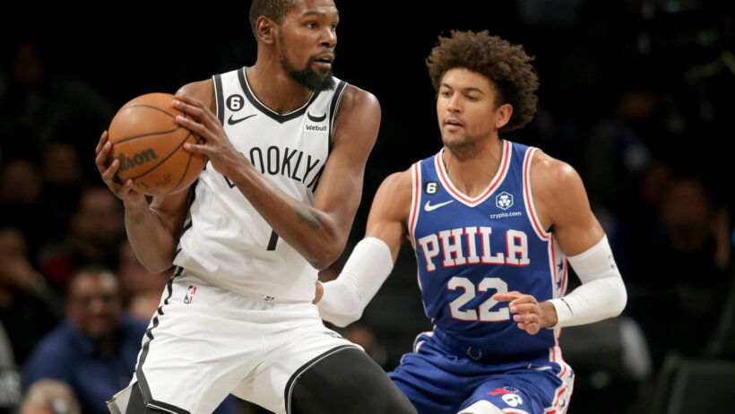 Brooklyn Nets forward Kevin Durant posting up Philadelphia 76ers guard Matisse Thybulle
