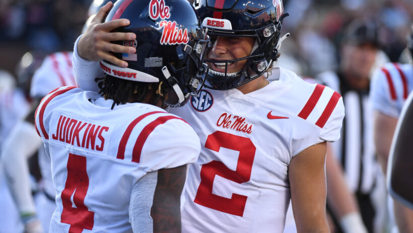 Ole Miss running back Quinshon Judkins celebrates with quarterback Jaxson Dart