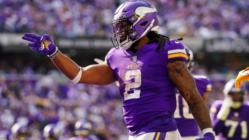 Minnesota Vikings running back Alexander Mattison celebrates a first down