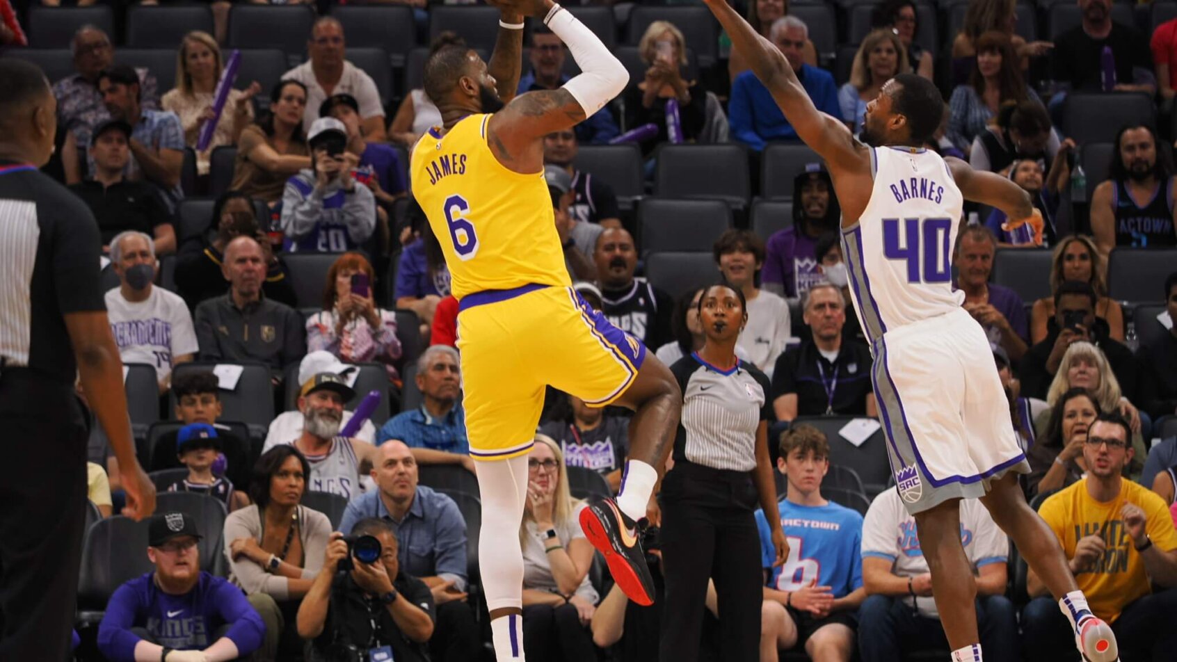 LeBron James takes a jumper during NBA preseason
