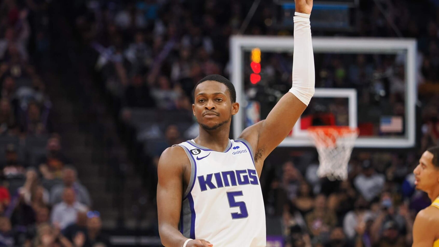Sacramento Kings point guard De'Aaron Fox celebrates a three