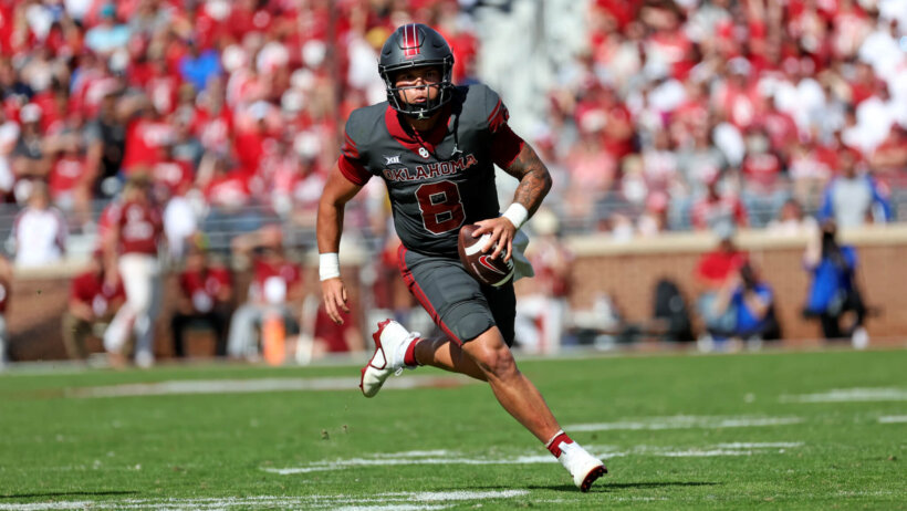 Oklahoma Sooners quarterback Dillon Gabriel runs with the ball