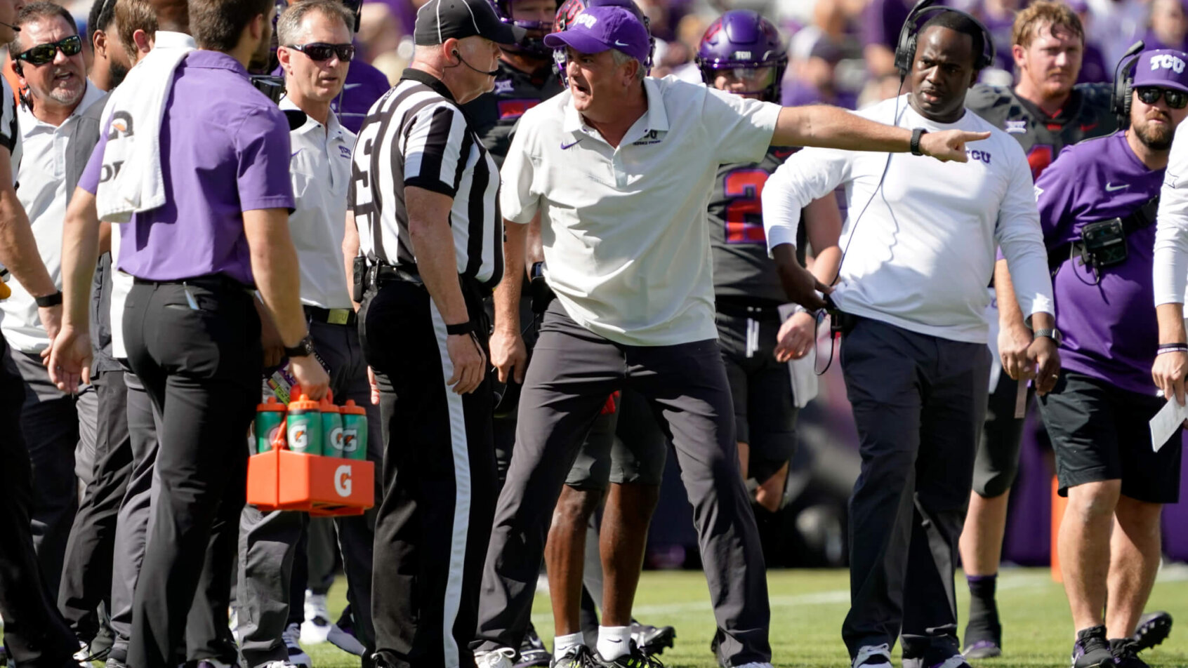 TCU Horned Frogs head coach Sonny Dykes yells at the official