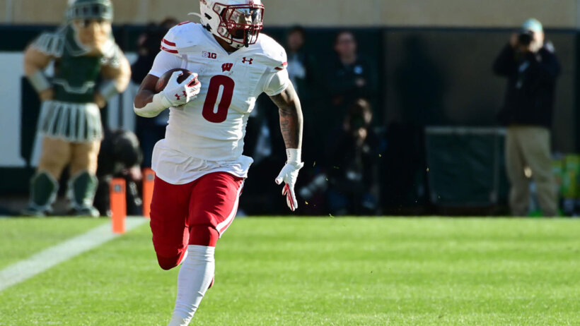 Wisconsin Badgers running back Braelon Allen sprints for a long first down
