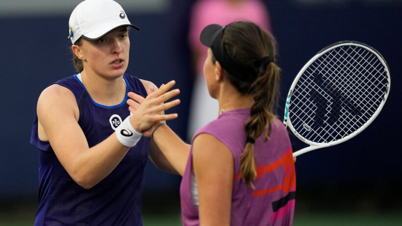 Iga Swiatek of Poland (left) greets Jessica Pegula of the United States after her win during the San Diego
