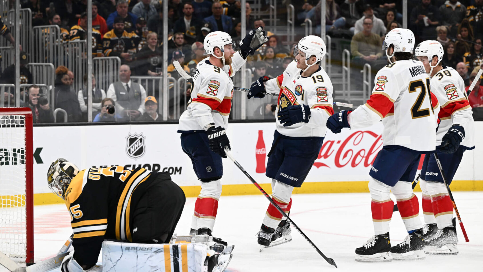Florida Panthers center Sam Bennett celebrates with left wing Matthew Tkachuk