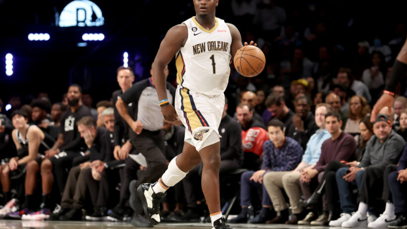 New Orleans Pelicans forward Zion Williamson dribbling up the court