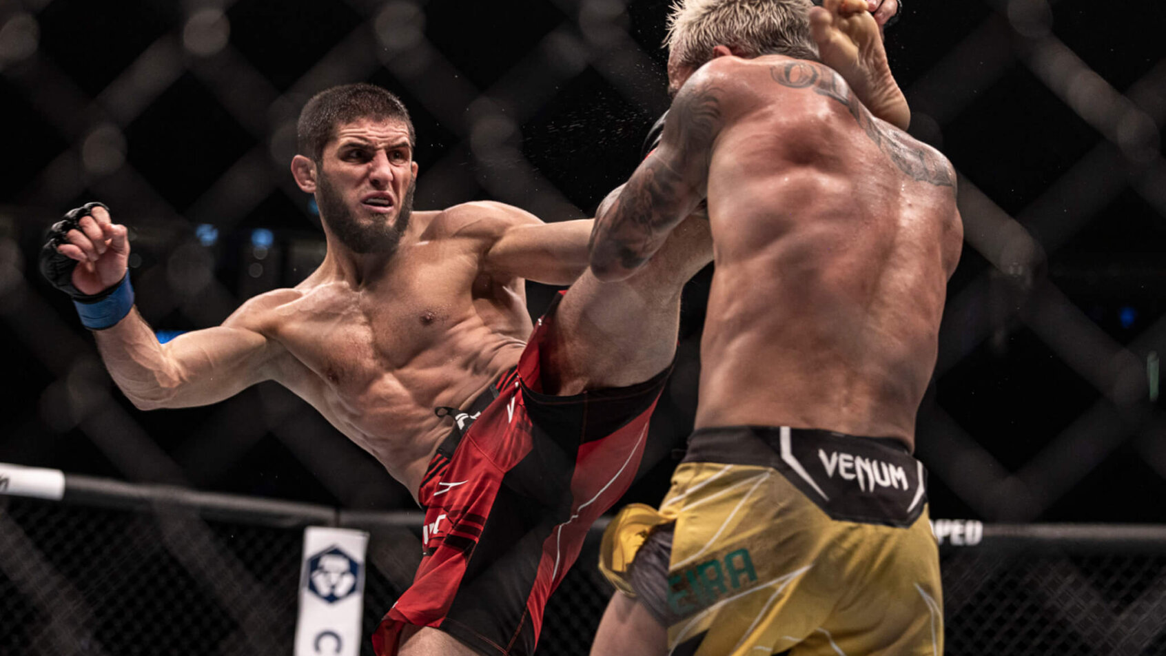 Charles Oliveira fighting Islam Makhachev