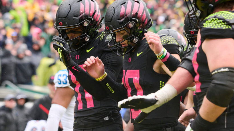 Oregon Ducks wide receiver Troy Franklin celebrates with quarterback Bo Nix after scoring a touchdown