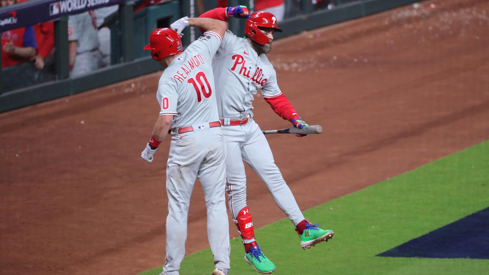 Phillies Bryce Harper and JT Realmuto celebrate during the World Series