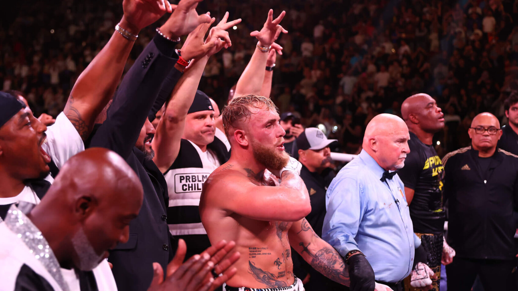 Jake Paul and his corner react before he is declared the winner