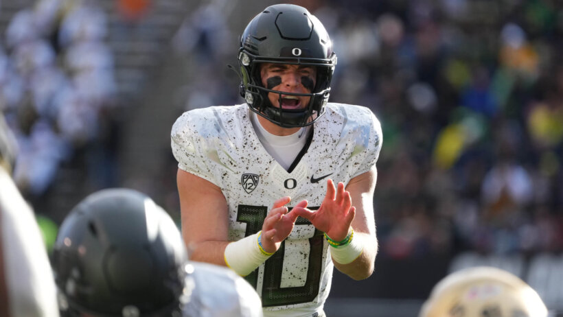 Oregon Ducks quarterback Bo Nix calls out for the ball