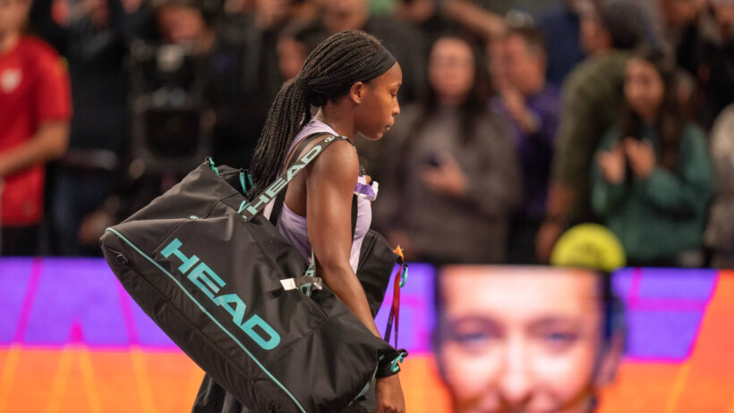 Gauff carrying her tennis bag