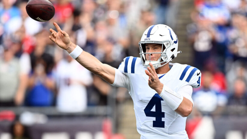 Indianapolis Colts quarterback Sam Ehlinger throws the ball