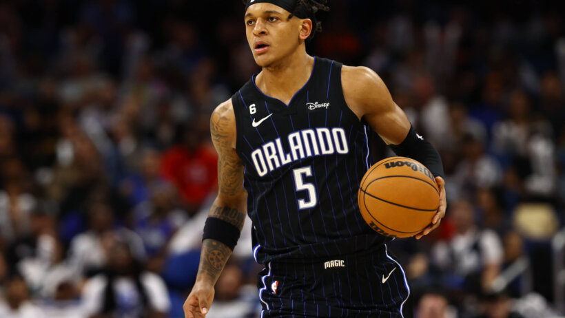 Orlando Magic forward Paolo Banchero dribbling