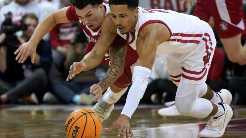 Wisconsin guard Jordan Davis goes after a loose ball