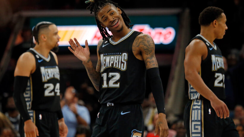 Memphis Grizzlies guard Ja Morant waving