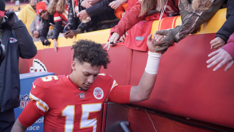 Kansas City Chiefs quarterback Patrick Mahomes congratulates fans