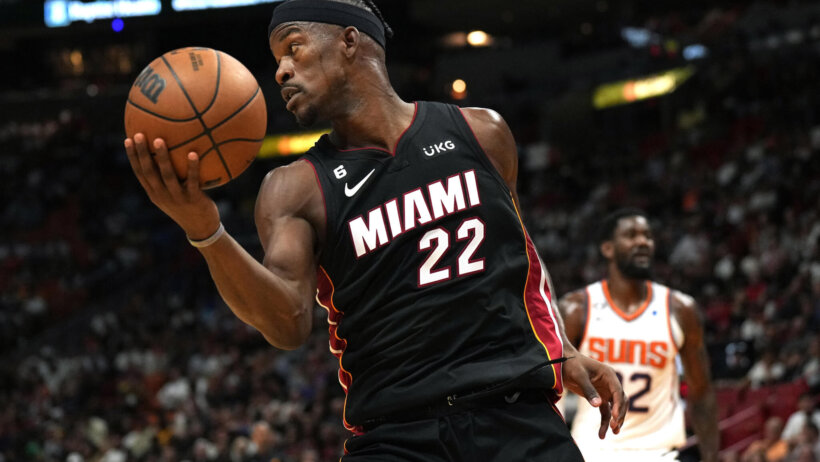 Jimmy Butler holding ball with right hand