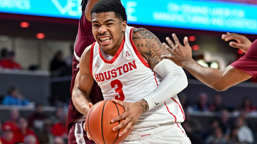 Houston Cougars guard Ramon Walker Jr driving to the basket