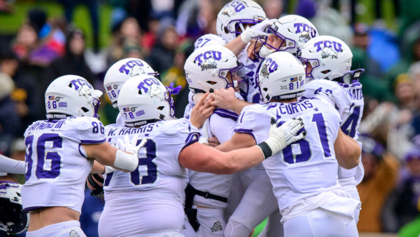 TCU players celebrating a game-winning field-goal