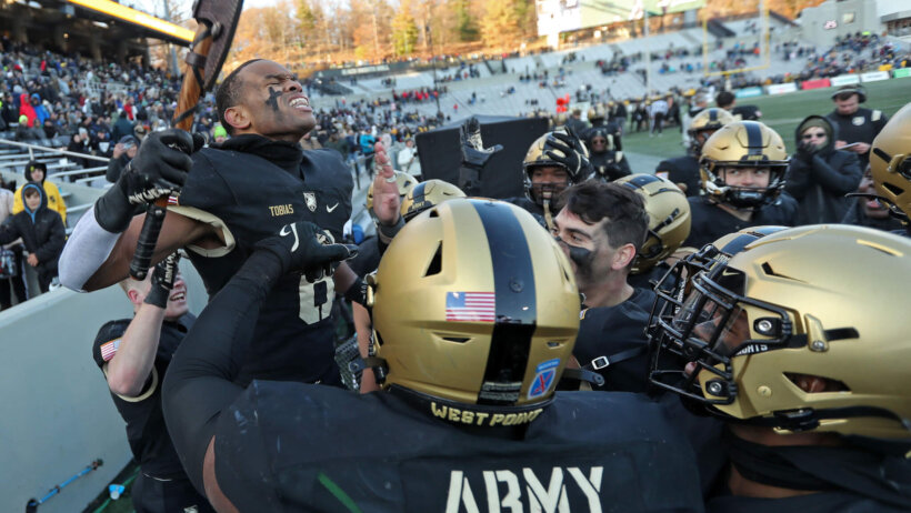 Army Black Knights defensive back D'Andre Tobias celebrates
