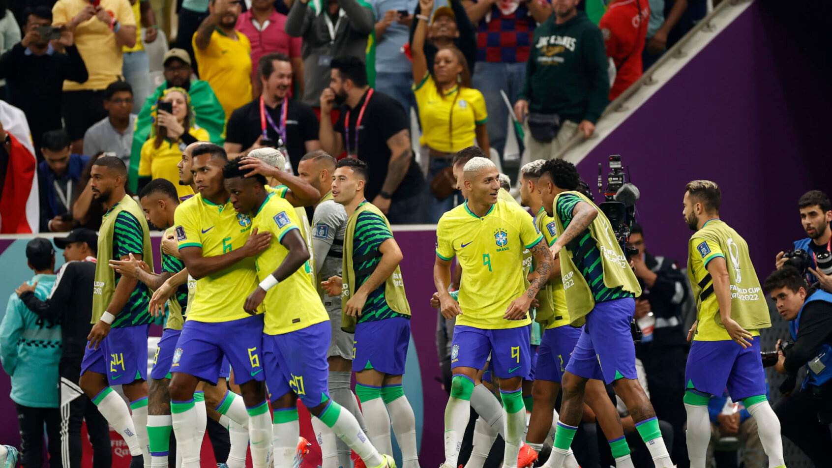 Brazil players celebrate a goal