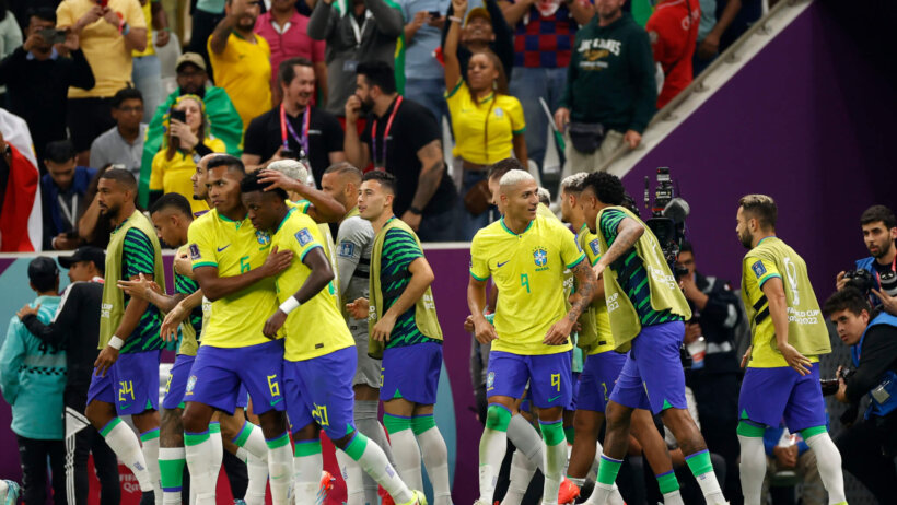 Brazil players celebrate a goal