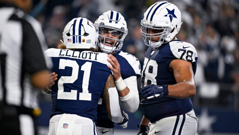 Cowboys players celebrating