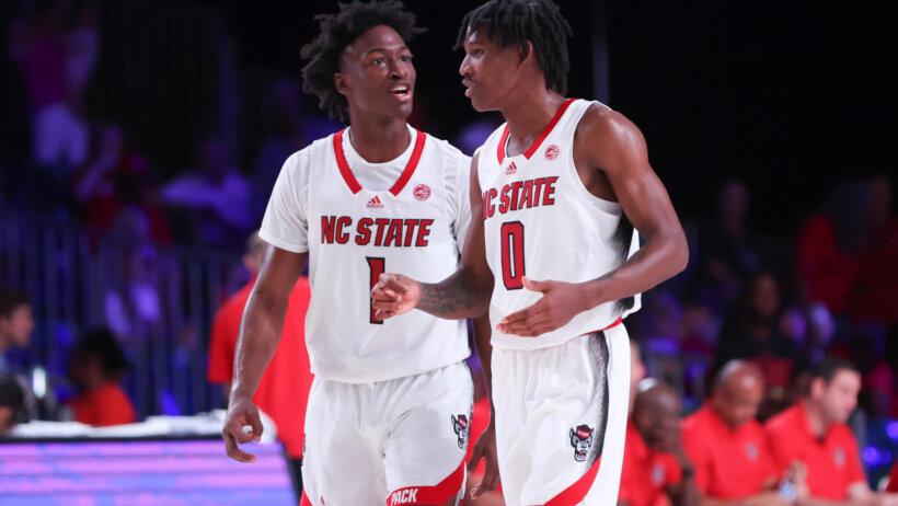 North Carolina State Wolfpack guards Jarkel Joiner and Terquavion Smith talking on the court