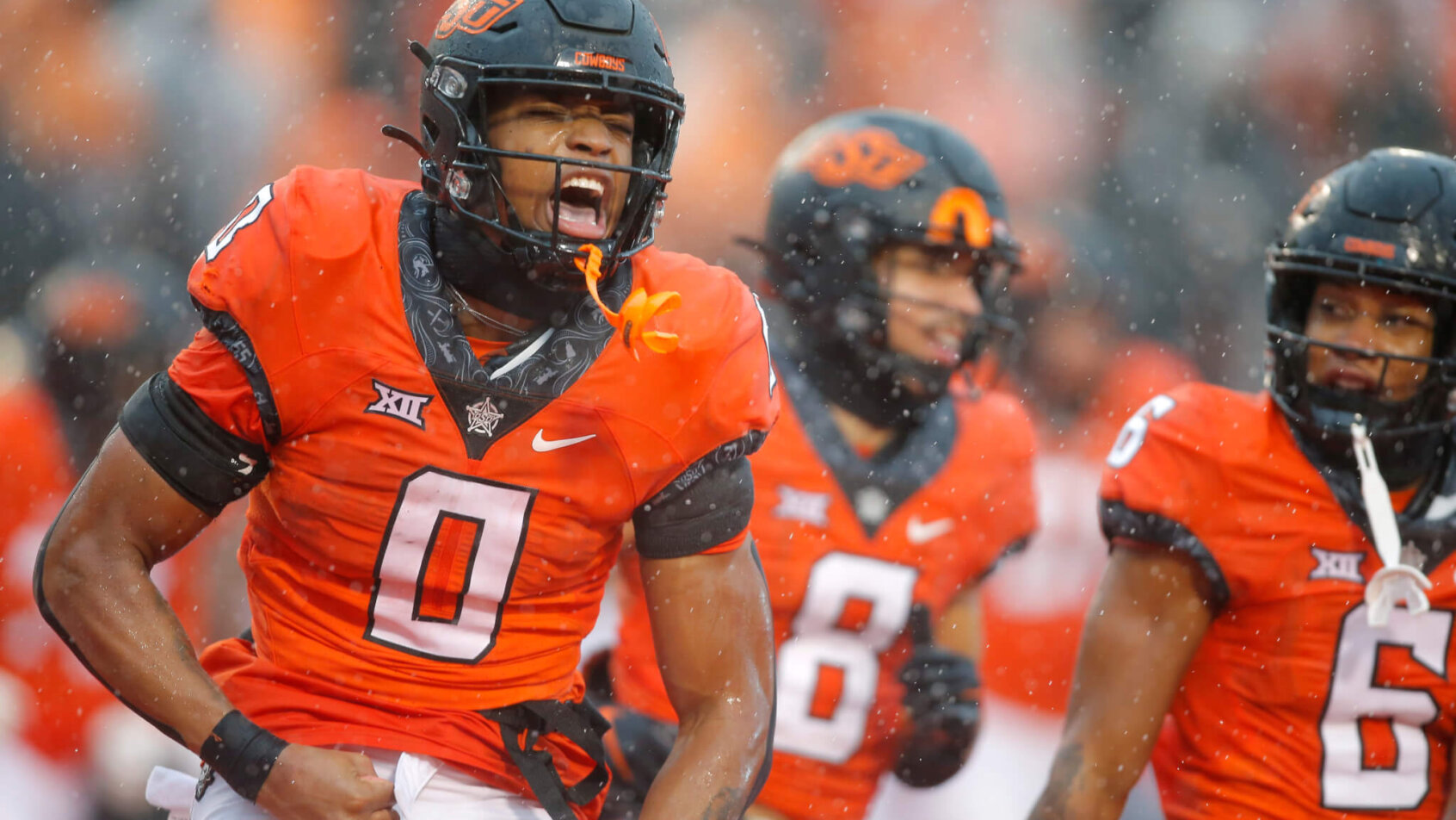 Oklahoma State Cowboys running back Ollie Gordon celebrates