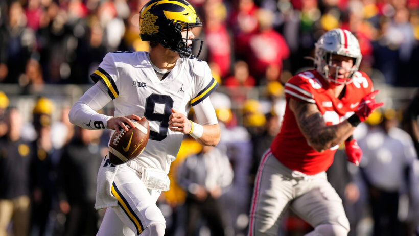 Michigan Wolverines quarterback J.J. McCarthy moving in the pocket