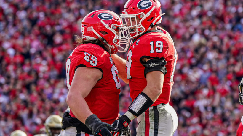 Georgia Bulldogs tight end Brock Bowers celebrates a TD with offensive lineman Tate Ratledge