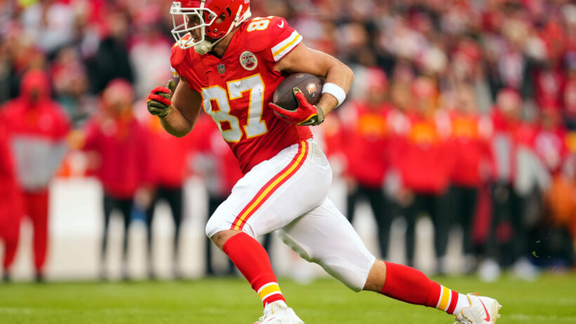 Kansas City Chiefs tight end Travis Kelce runs with the ball