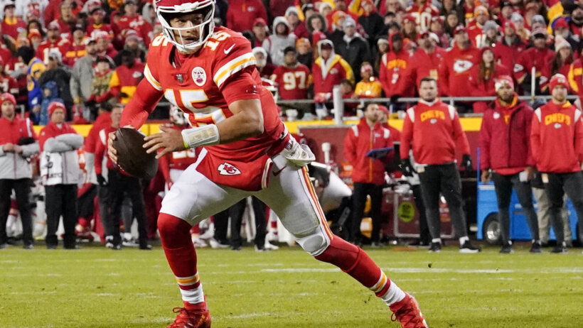 Kansas City Chiefs quarterback Patrick Mahomes scrambles