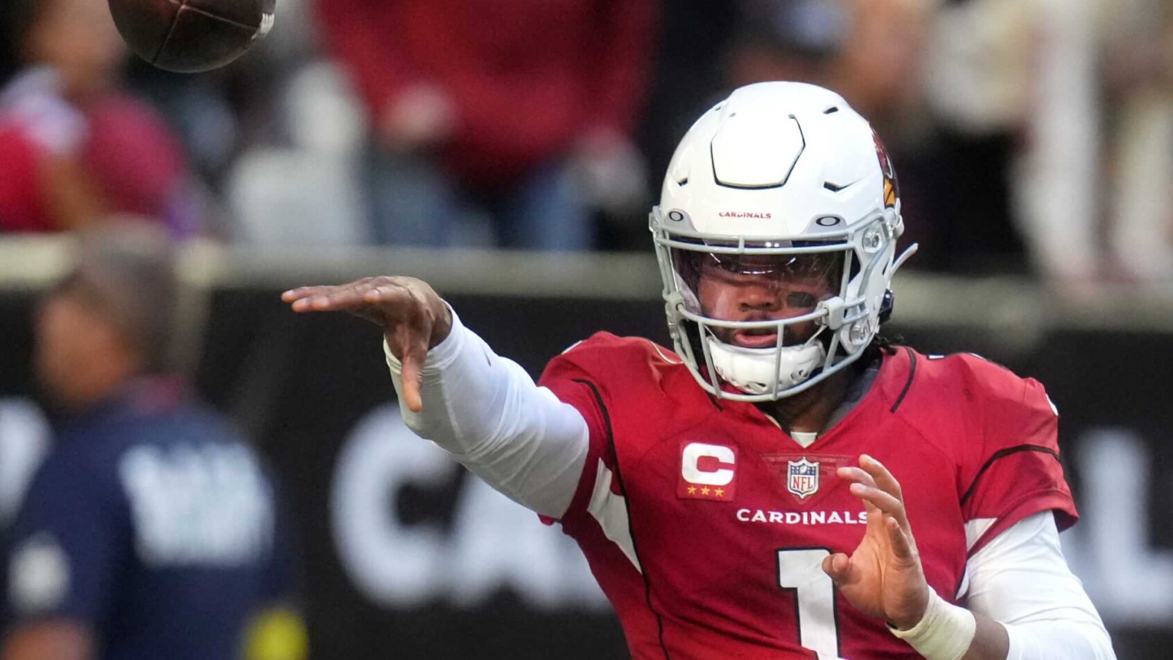 Arizona Cardinals quarterback Kyler Murray throwing a pass