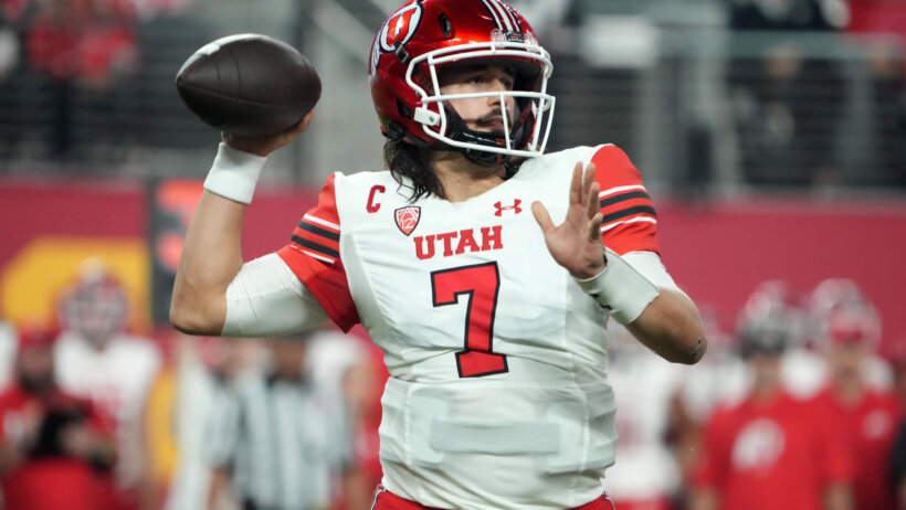 Utah Utes quarterback Cameron Risingmthrows the bal