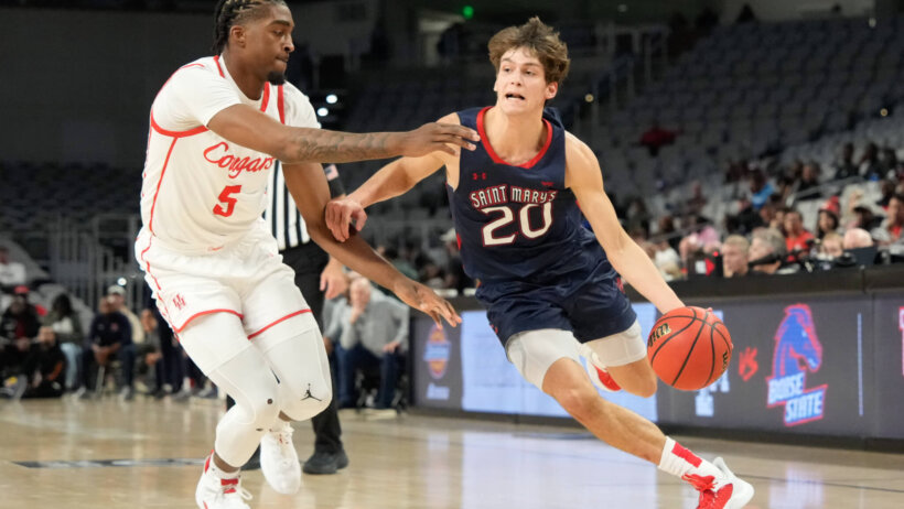 St. Mary's Gaels guard Aidan Mahaney drives vs Houston Cougars forward Ja'Vier Francis.