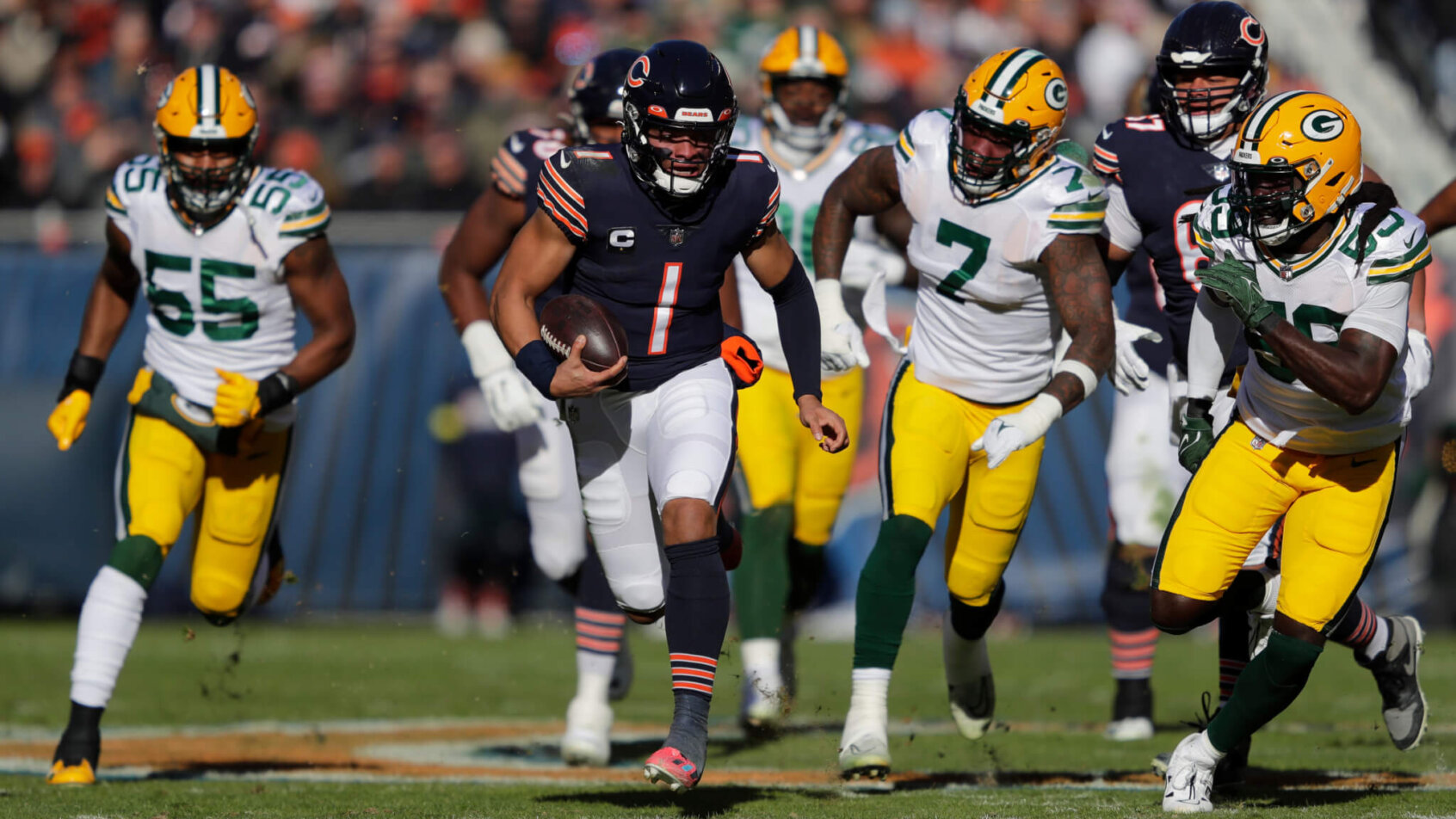 Chicago Bears quarterback Justin Fields breaks away