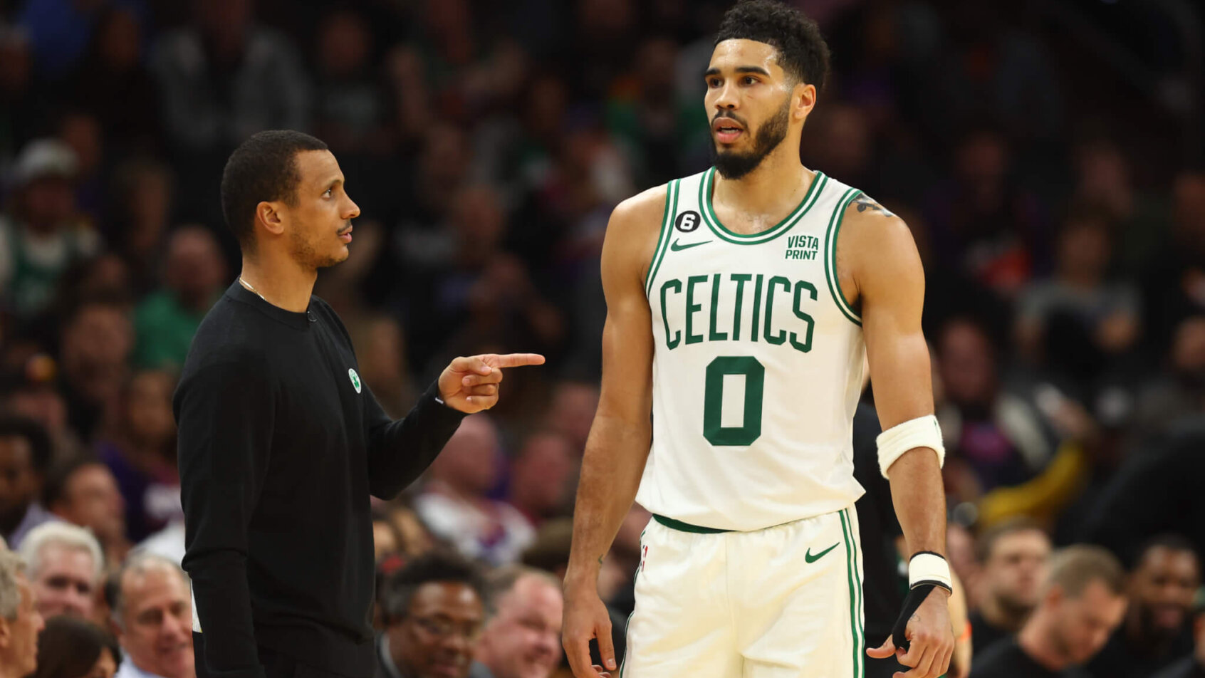 Jayson Tatum talking to head coach Joe Mazzulla