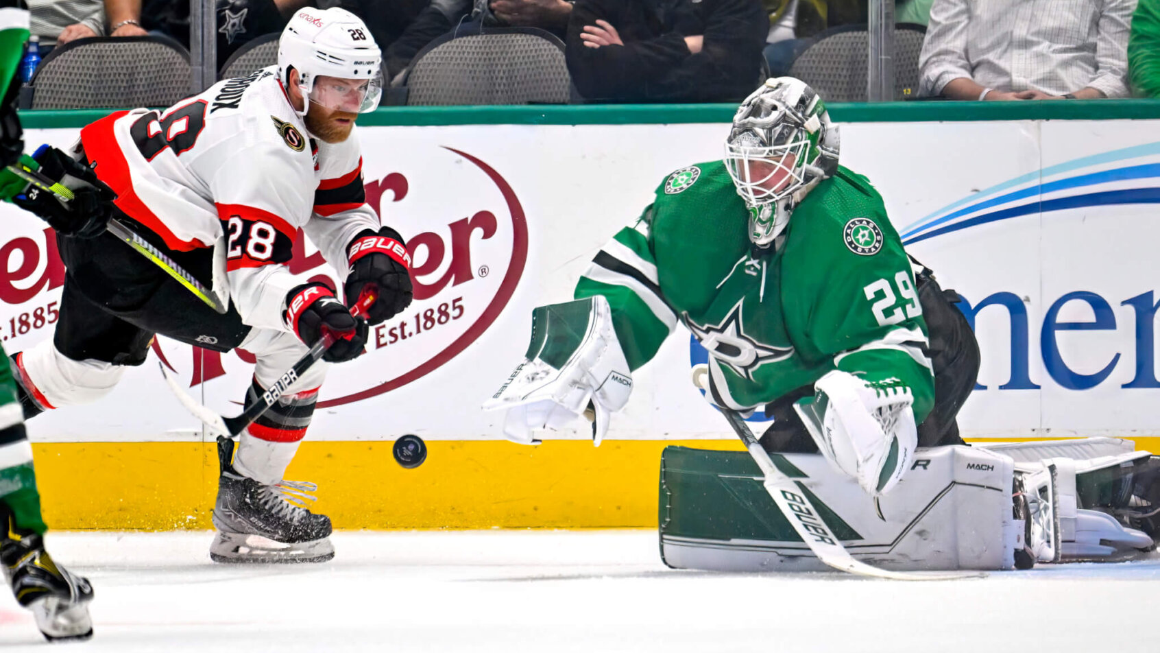 Dallas Stars goaltender Jake Oettinger makes a save