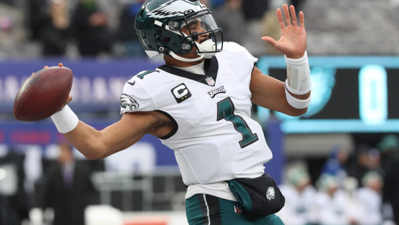 Philadelphia Eagles quarterback Jalen Hurts warms up